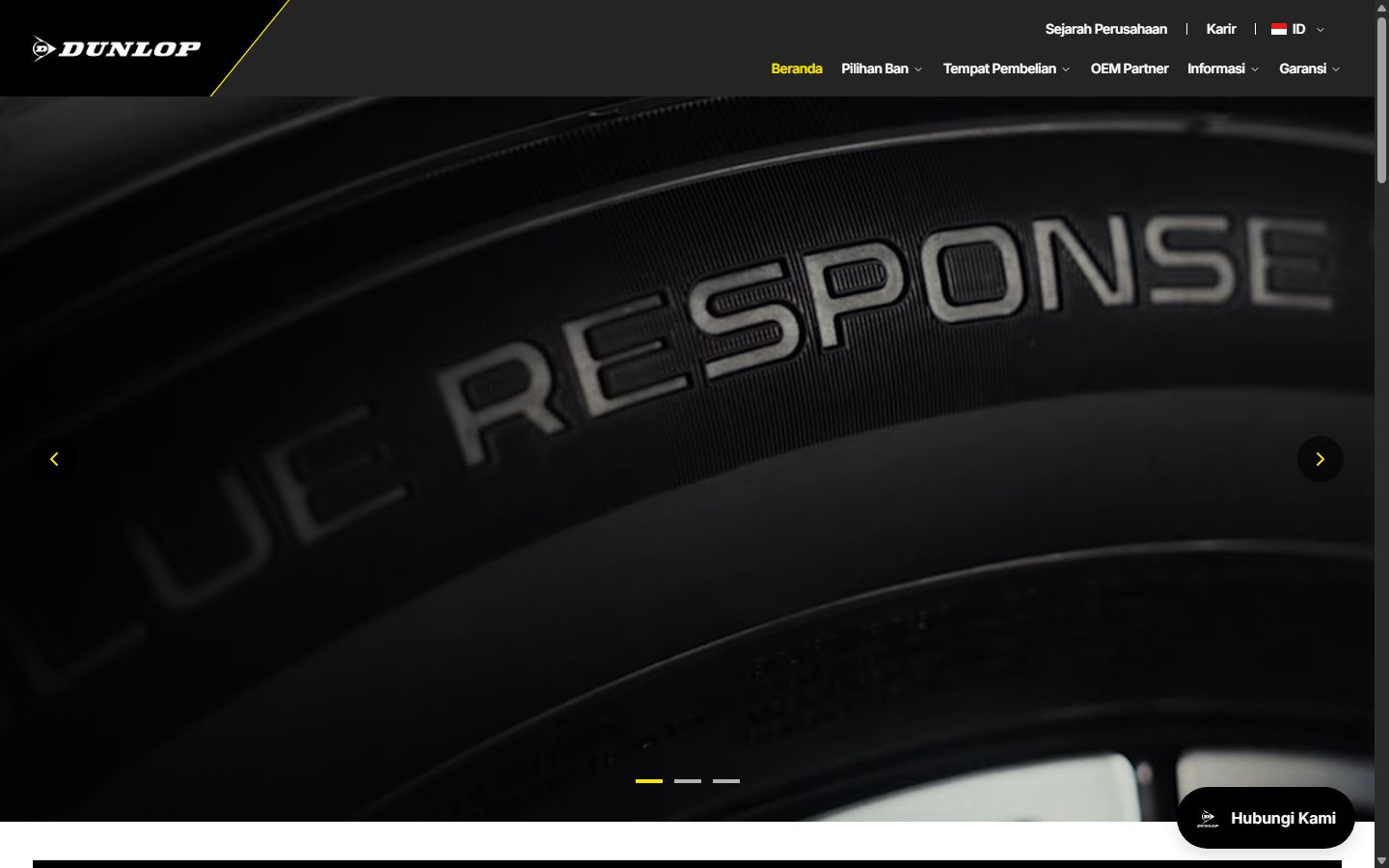 Tampilan desktop situs Dunlop Indonesia menampilkan halaman utama dengan navigasi produk ban